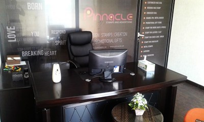 Pinnacle Stamps & Advertising