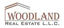 Woodland Real Estate Logo